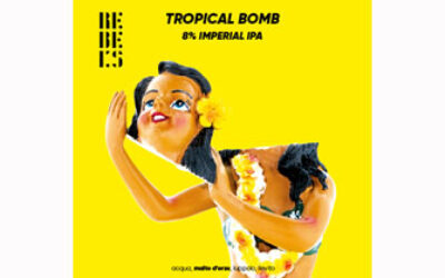 TROPICAL BOMB imperial IPA, etichetta con donna hawaiana su sfondo giallo